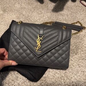 Saint Laurent envelope quilted grain de poudre embossed leather crossbody bag